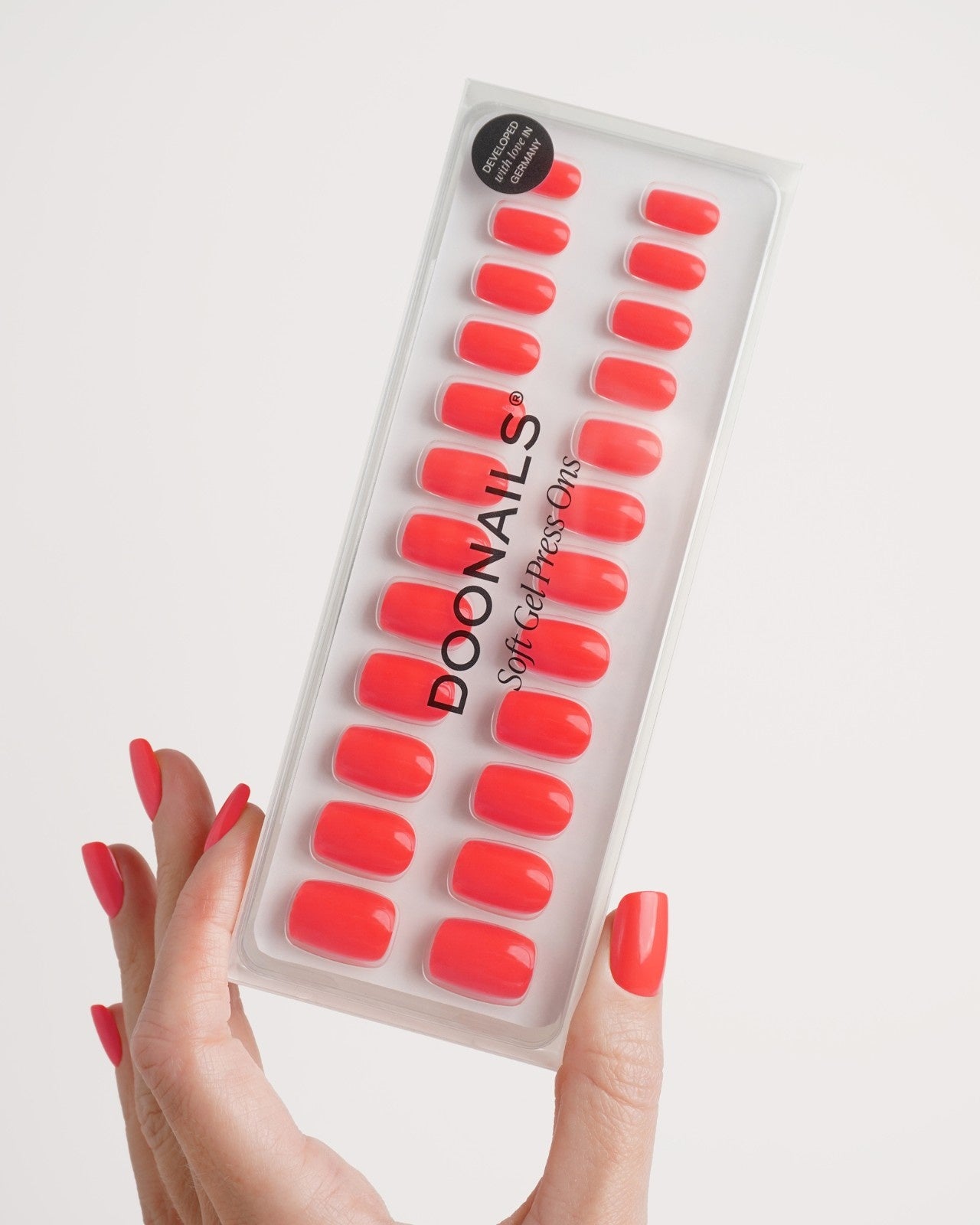 Sunset Coral Short Square Soft Gel Press Ons - Doonails Switzerland