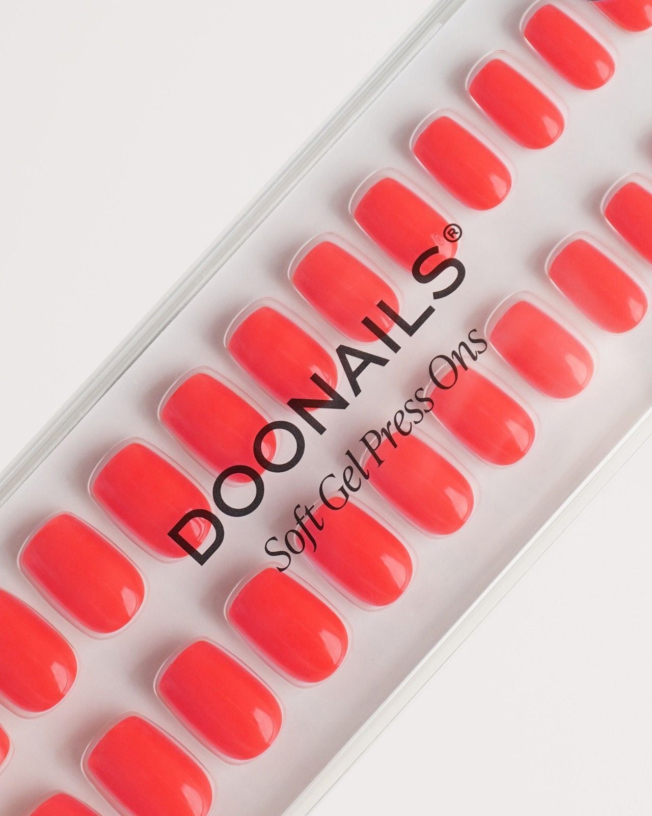 Sunset Coral Short Square Soft Gel Press Ons - Doonails Switzerland