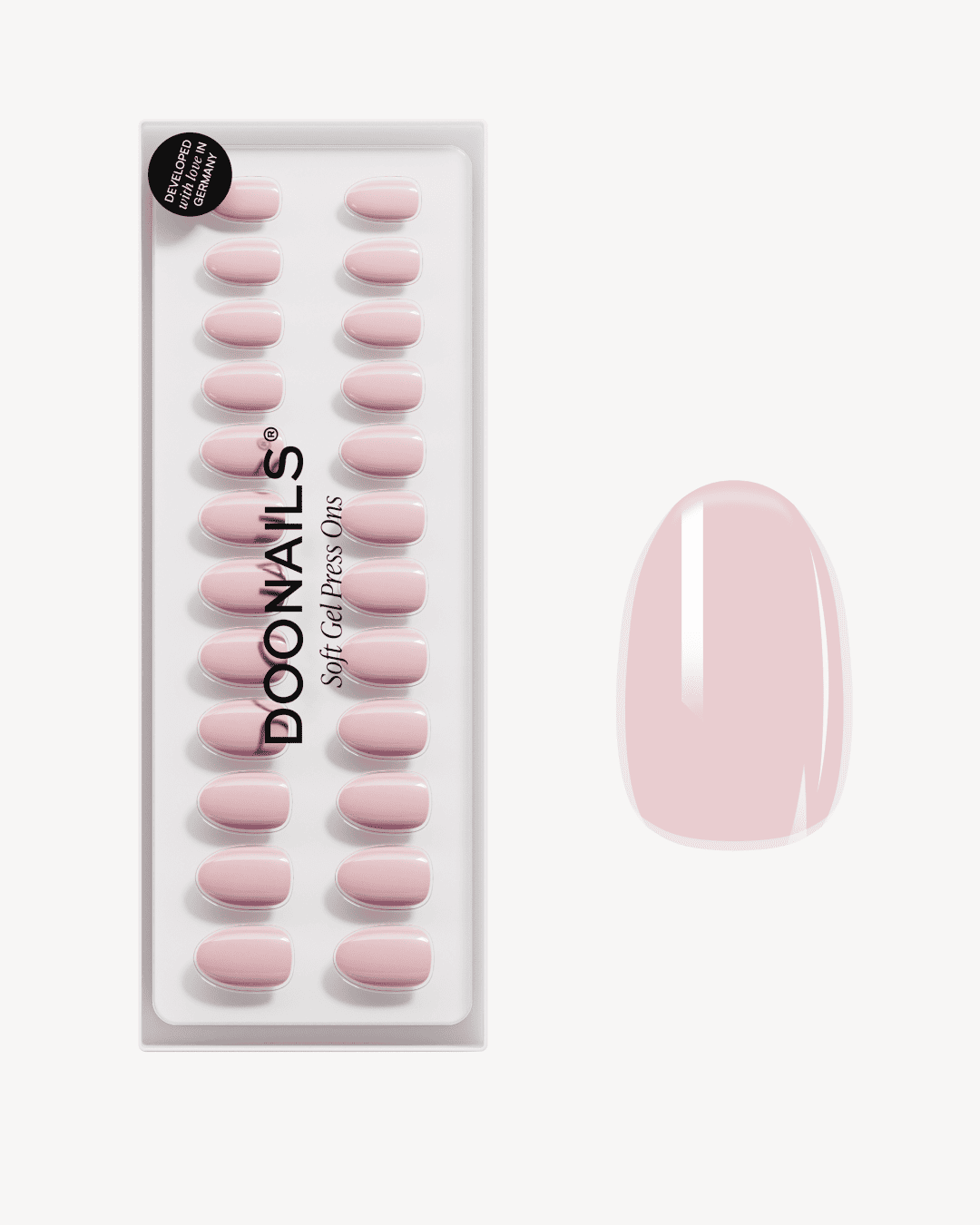 Ballerina Soft Gel Press Ons auf beigem Hintergrund