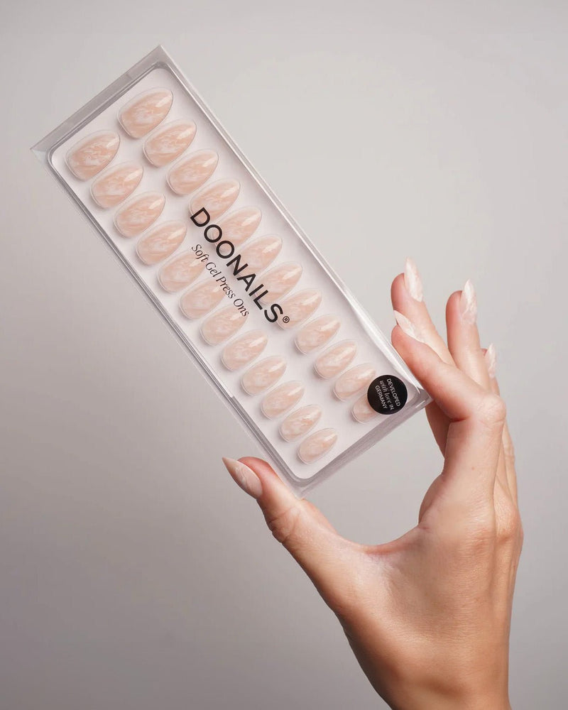 Nude Marble Short Almond Soft Gel Press Ons - Doonails Switzerland