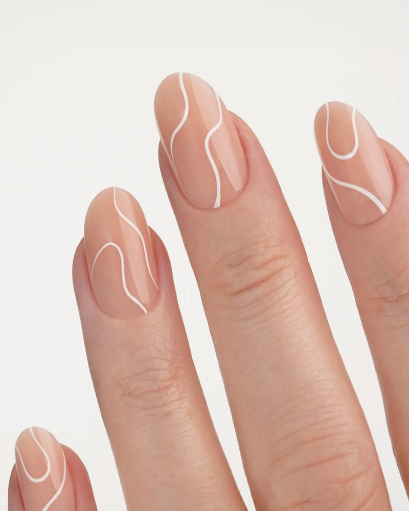 White Swirl Medium Round Soft Gel Press Ons - Doonails Switzerland