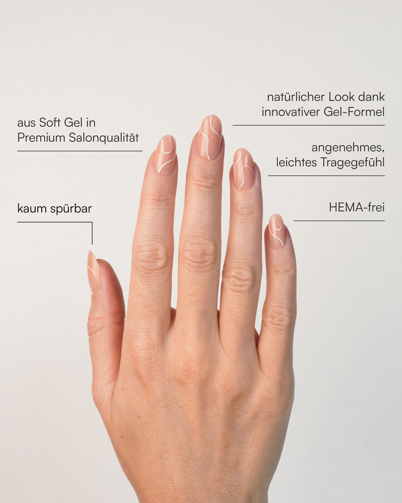 White Swirl Medium Round Soft Gel Press Ons - Doonails Switzerland