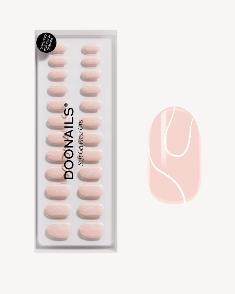White Swirl Medium Round Soft Gel Press Ons - Doonails Switzerland